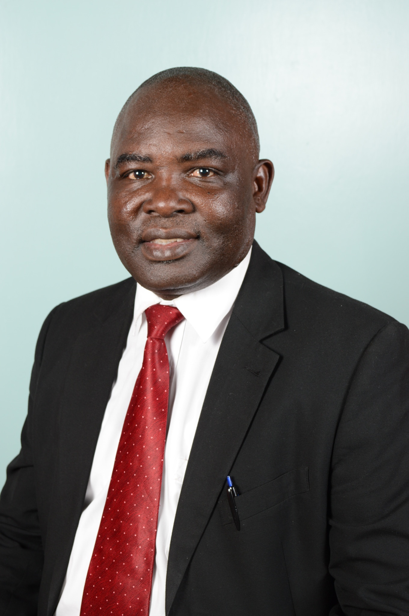 Hon. Nick Ochola, MBA, B.A.